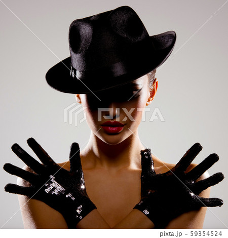 Portrait of a woman in a black hat Portrait of a woman in a black hat 59354524