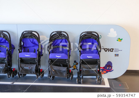 wien international airport, Wien, Austria, 11/02/2019 , Baby stroller, or baby carriage service in Wien international airport. wien international airport, Wien, Austria, 11/02/2019 , Baby stroller, or baby carriage service in Wien international airport. 59354747