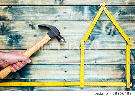 Carpenter's work tools on wooden background. 59356498