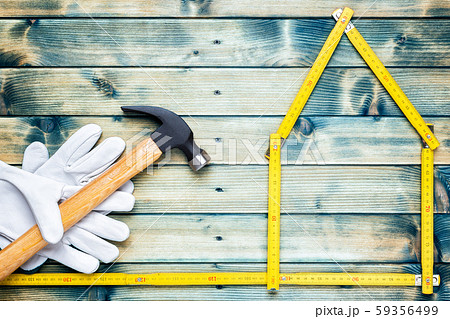 Carpenter's work tools on wooden background. Carpenter's work tools on wooden background. 59356499