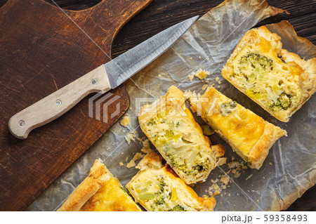 Broccoli, cheese and leek tart, vegetarian cuisine. 59358493