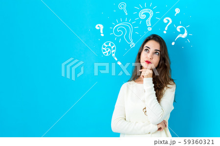 Question marks with young woman 59360321