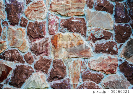 background from a wall erected from roughly treated brown 59366321