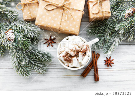 Christmas composition with hot chocolate and gift Christmas composition with hot chocolate and gift 59373525