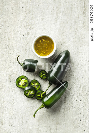 Green jalapeno pepper and tabasco sauce. 59374924