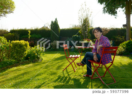 beautiful mature woman in the garden beautiful mature woman in the garden 59377396