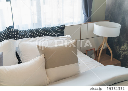 modern bedroom with set of pillows modern bedroom with set of pillows 59381531