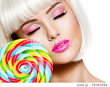 Face of a beautiful  girl with pink make-up and 59383689
