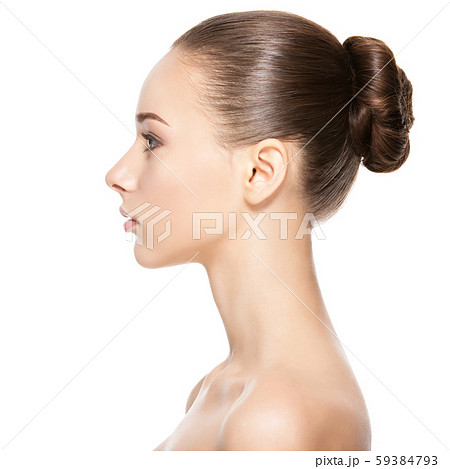 Profile face of young woman with clean skin Profile face of young woman with clean skin 59384793