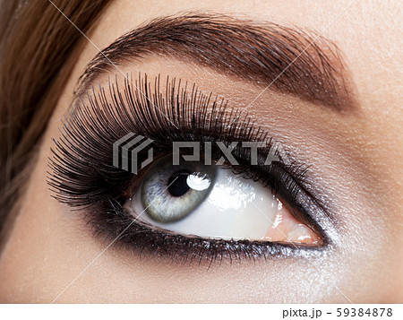 woman's eye with black eye makeup. Macro style woman's eye with black eye makeup. Macro style 59384878