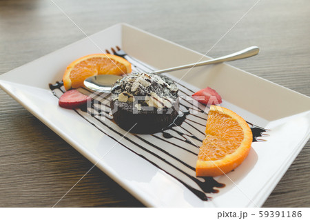 chocolate lava cake with fresh fruit and coffee chocolate lava cake with fresh fruit and coffee 59391186