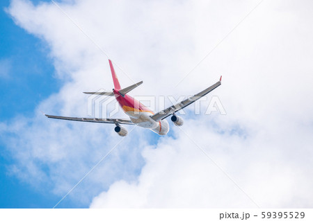 Airplane takes off from international airport on 59395529