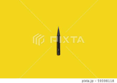 Black used pencil isolated on a yellow background Black used pencil isolated on a yellow background 59398118