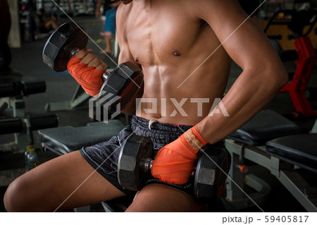 Thai boxer sport man doing exercise with Thai boxer sport man doing exercise with 59405817