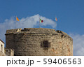 Torre di Porta Terra with three flags - catalan, italian and sar 59406563