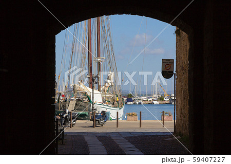 View from the gateway to marina in Alghero city, Sardinia, Ital 59407227