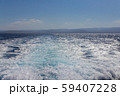 Splashes of clear turquoise sea water on sardinian seashore 59407228