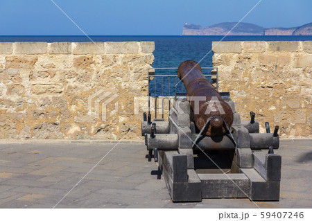 Historical cannon in old town of Alghero, Sardinia island, Italy 59407246