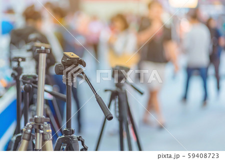 Tripod camera for sale at Trade show on photography equipment. Tripod camera for sale at Trade show on photography equipment. 59408723