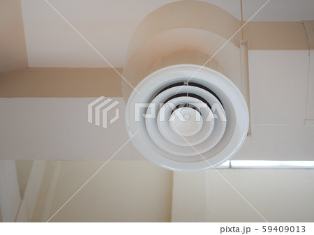 Air Ventilating tube installed on the ceiling of the office building. 59409013