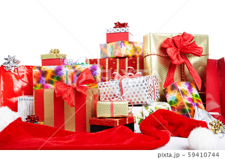 A pile of Christmas gifts in colorful wrapping 59410744