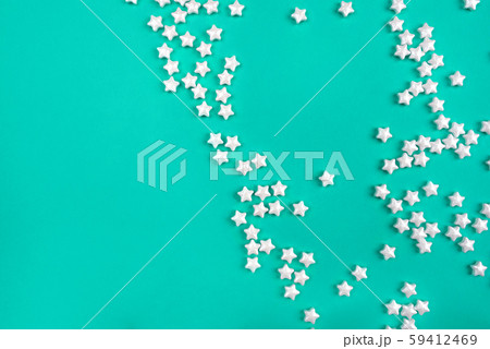 Little white stars on mint background. Little white stars on mint background. 59412469