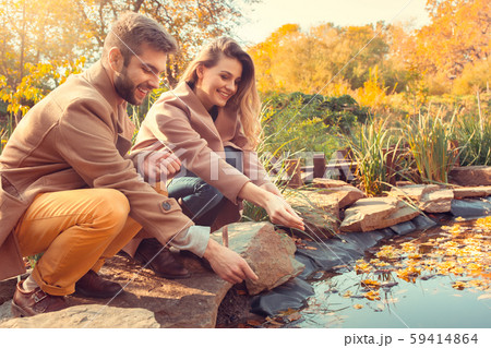Young couple walk in the autumn park 59414864