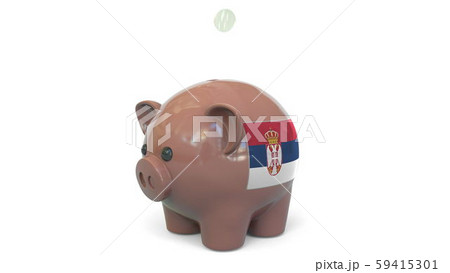 Putting money into piggy bank with flag of Serbia. Tax system system or savings related conceptual Putting money into piggy bank with flag of Serbia. Tax system system or savings related conceptual 59415301