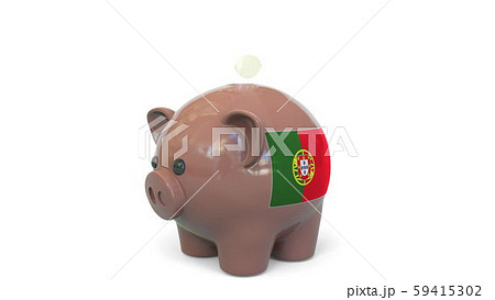 Putting money into piggy bank with flag of Portugal. Tax system system or savings related conceptual Putting money into piggy bank with flag of Portugal. Tax system system or savings related conceptual 59415302