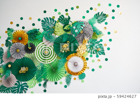 Green, emerald, gold and yellow papers circle shape of origami. Abstract background of paper designs Green, emerald, gold and yellow papers circle shape of origami. Abstract background of paper designs 59424627