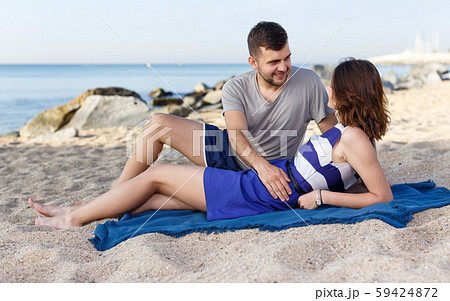 Happy loving couple resting and hugging Happy loving couple resting and hugging 59424872