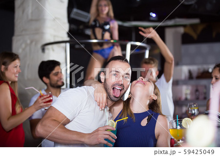 couple in the night club with drinks couple in the night club with drinks 59425049