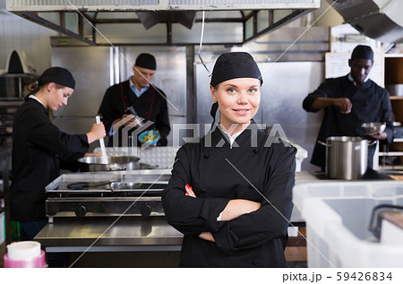Confident young woman chef 59426834