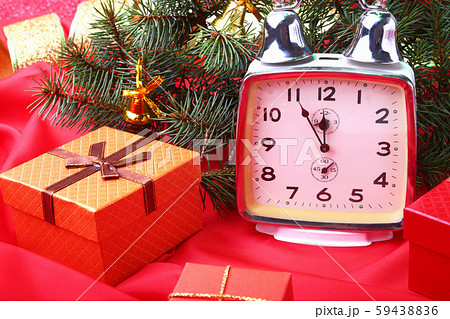 Christmas vintage clock. New Year's Decoration with gift boxes, christmas balls and tree 59438836
