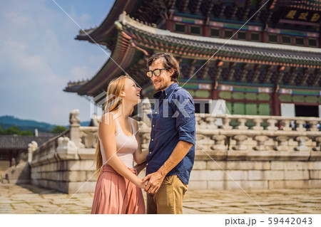 Young couple of spouses, a bride and groom, a husband and wife, boyfriend and girlfriend spend time Young couple of spouses, a bride and groom, a husband and wife, boyfriend and girlfriend spend time 59442043