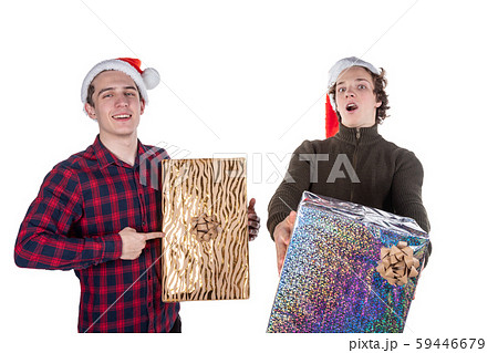 Two funny young men celebrating christmas isolated 59446679
