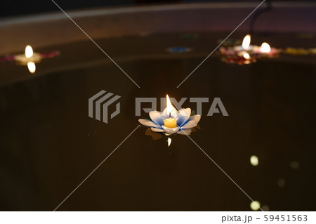 Thai Loi Krathong tradition uses materials made from candles floating in the water. Thai Loi Krathong tradition uses materials made from candles floating in the water. 59451563