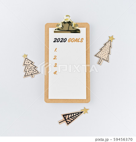 Holiday decorations and clipboard with wish list Holiday decorations and clipboard with wish list 59456370