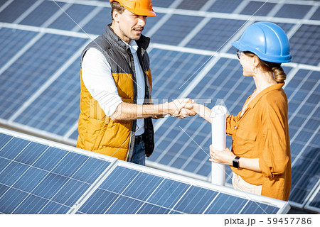 Engineers on a solar power station Engineers on a solar power station 59457786