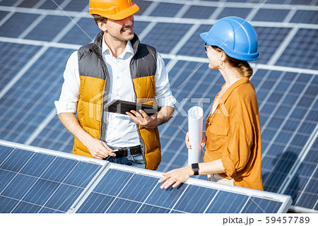Engineers on a solar power station Engineers on a solar power station 59457789