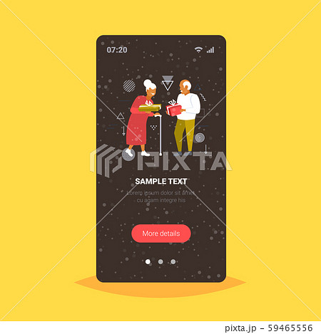 senior couple giving gift present boxes to each other merry christmas happy new year winter holiday 59465556