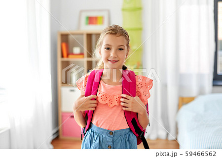 student girl with school bag at home student girl with school bag at home 59466562