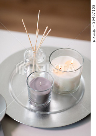 aroma reed diffuser an candles burning on tray aroma reed diffuser an candles burning on tray 59467108