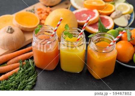 mason jar glasses of vegetable juices on table mason jar glasses of vegetable juices on table 59467802