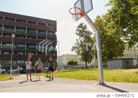 group of male friends going to play basketball group of male friends going to play basketball 59469271