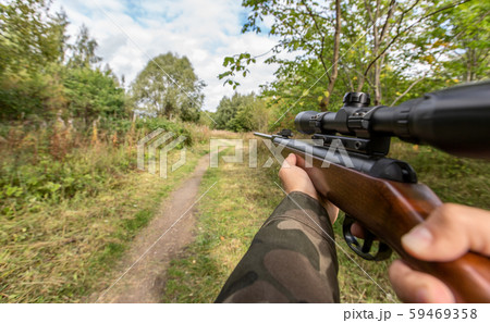 POV of male hands shooting with air rifle POV of male hands shooting with air rifle 59469358