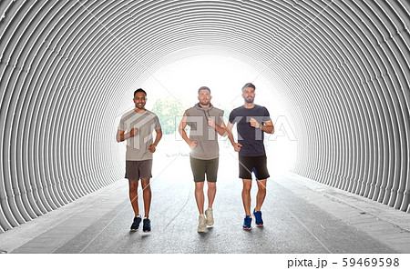 young men or male friends running outdoors 59469598