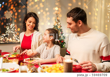 happy family having christmas dinner at home 59469709