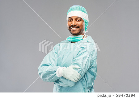 indian male doctor or surgeon in protective wear indian male doctor or surgeon in protective wear 59470294