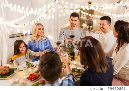 happy family having dinner party at home 59470861